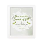 Christian wall art featuring 'You Are The Temple of God His Spirit Dwells in You' from 1 Corinthians 3:16 with green and gray design. hung on the wall in a white frame