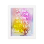 Christian wall art with Psalm 63:3, bold text in playful font, vibrant yellow, pink, and purple gradient on a warm background with a black frame. hung on the wall in a white frame