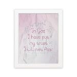 Christian wall art featuring Psalm 56:4, with soft pink background and elegant script font. Perfect for home decor. hung on the wall in a white frame