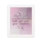 Christian wall art with the verse May The Lord Cause You To Flourish Both You And Your Children Psalm 115:14 in soft colors and floral design. hung on the wall in a white frame