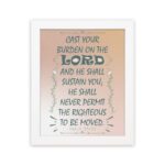 Cast Your Burden on the Lord Psalm 55:22 Bible verse wall art with teal lettering and soft peach background, Christian home decor. hung on the wall in a white frame