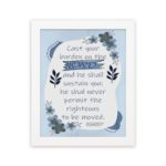 Christian wall art featuring Psalm 55:22 with navy blue text on a light blue and white background, decorated with blue flowers. hung on the wall in a white frame