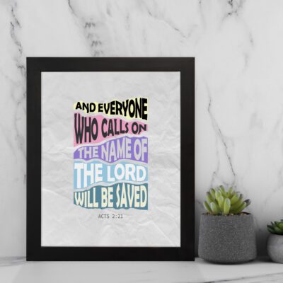 Acts 2:21 Bible verse wall art with pastel-colored bold text on a light gray background. And everyone who calls on the name of the Lord. displayed on the wall in a black frame