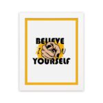 Inspirational quote wall art with "Believe In Yourself" on a white and yellow background and white framed displayed on the wall. Perfect for motivating your workspace.