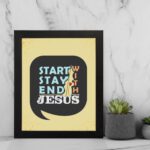 Bible wall art featuring Start With Jesus, Stay With Jesus, End With Jesus in a speech bubble shape with blue and white text on a light beige background. displayed on the wall in a black frame