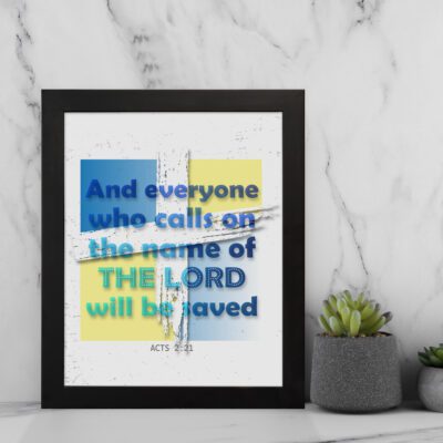 Acts 2:21 Bible Verse Wall Art with bold fonts and light blue highlights on "The Lord" against a textured white and yellow background. displayed on the wall in a black frame