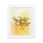 Jesus Christ Bible Wall Art in black script with a yellow cross and watercolor background, framed in black. Perfect Christian home decor. hung on the wall in a white frame