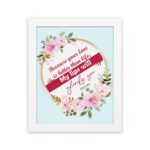 Beautiful wall art with the quote Because your love is better than life from Psalm 63:3, featuring a floral design on a light blue background. hung on the wall in a white frame