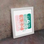 Infidu I Am A Child Of God John 1:12 Christian Wall Art with modern pink and green gradient design on a playful background. displayed on the wall in a white frame