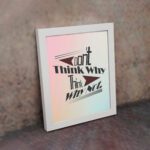 Infidu Don't Think Why, Think Why Not wall art with a red flower design a light blue, gray, and light pink background, and a white frame on the wall. Inspiring decor for home offices and workspaces.