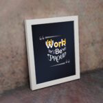 Infidu Work Hard Be Proud office wall art featuring motivational quotes on a navy blue background and a white frame on the wall. Perfect for home offices and study areas.