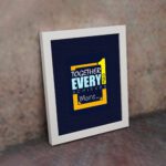 Infidu motivational quotes wall art featuring Together Everyone Achieves More on a navy blue background and white frame displayed on the wall. Perfect for inspiring your workspace.