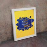 Infidu If The Plan Doesn't Work Change The Plan But Never The Goal wall art with a yellow background and dark blue design and white frame on the wall. Inspiring decor for home offices and workspaces.