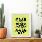 Infidu If The Plan Doesn't Work Change The Plan But Never The Goal wall art with a light green background and dark blue star design and white frame on the table. Inspiring decor for home offices and workspaces.