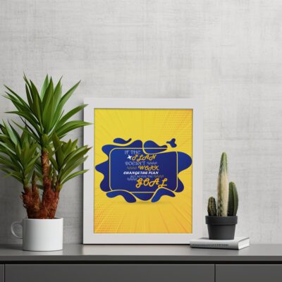 Infidu If The Plan Doesn't Work Change The Plan But Never The Goal wall art with a yellow background, dark blue design, and a white frame on the table. Inspiring decor for home offices and workspaces.