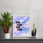 Infidu motivational quotes wall decor featuring The Harder You Work The Better You Get on a mixed white, pink, and navy blue background on the table. Perfect for inspiring your workspace.