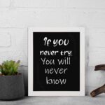 Infidu motivational quotes wall art featuring If You Never Try You Will Never Know on a dark black background and white frame displayed on the wall. Perfect for inspiring your workspace.