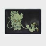 stunning vintage art print of a golden-eyed monster from Momoyogusa Flowers of a Hundred Generations,placed on the wall