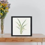 Vintage art print featuring the captivating "Mirau March" painting,displayed on a table with black frame