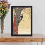 Discover the beauty of a Great Spotted Woodpecker in this vintage art print by Ohara Koson,placed on the wall