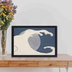 Add the power of nature with this Kamisaka Sekka waves and sun art print,kept on a table