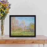 Transform your space with this vintage art print of Claude Monet's "Spring in Giverny",mounted on the wall with black frame