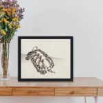 Serene turtle art print by Kono Bairei,displayed on a table