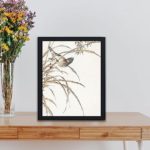 Experience the harmony of nature with this Japanese Grey Bunting and Rise Plant art print by Numata Kashu,kept on a table