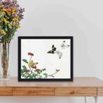 This stunning vintage art print of butterflies and a flower by Morimoto Toko,framed and placed on the wall