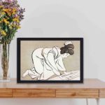 Experience the beauty of Japanese culture with this Goyo Hashiguchi kimono art print,kept on a table