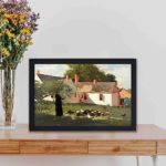 beauty of rural life with Winslow Homer's "Farmyard Scene" art print,displayed on a table