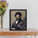 Our vintage art print of Raphael's "Portrait of Baldassarre Castiglione",displayed on a table