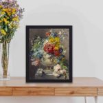 This vintage art print of a stunning flower bouquet in a vase,kept on a table with black frame