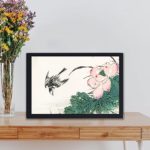 Experience the harmony of nature with this Japanese Pied Wagtail and red lotus art print by Numata Kashu,displayed on a table