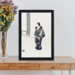 Vintage art print featuring "Actor in the No Play Tomonaga" by Kogyo Tsukioka,kept on a table with black frame