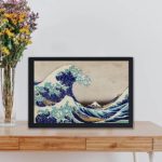 Experience the power and beauty of nature with "The Great Wave off Kanagawa" by Katsushika Hokusai,placed on the wall