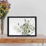 Enhance your decor with this stunning vintage art print of wild dandelions by Watanabe Seitei,kept on a table