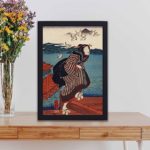 Discover the beauty of Edo-period Japan. Sanbashi no Onna art print. Stunning ukiyo-e by Kuniyoshi, kept on a table with black frame