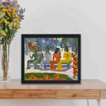 vintage art print of Paul Gauguin's "We Shall Not Go to Market Today" (1892),kept on a table with black frame