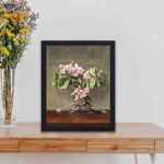 Elevate your home with Apple Blossoms by Heade,kept on a table with black frame