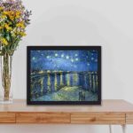 This vintage canvas print captures the magic of the 1888 masterpiece,kept on a table with black frame