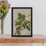 Elevate your space with the timeless beauty of nature,kept on a table with black frame