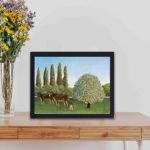 vintage art print of Henri Rousseau's "Meadowland (The Pasture)" (1910),kept on a table