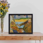 Vintage canvas print of Gauguin's "The Painter of Sunflowers" (1888),kept on a table with black frame