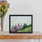 The beauty of the French Riviera with Caillebotte's "Villas at Trouville." displayed on a table