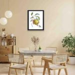 Our vintage art print featuring a Royal d'hiver fruit tree,hung on a yellow background wall with black frame