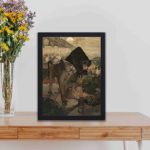 Vintage art print of Paul Gauguin's "Arearea." displayed on a table with black frame