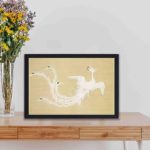 Experience the beauty of nature with this Kamisaka Sekka bird art print,displayed on a table