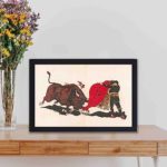 Feel the adrenaline rush with this vintage matador and bull art print,kept on a table