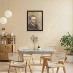 Vintage art print of Vincent van Gogh's iconic "Self-Portrait",mounted on the wall with black frame